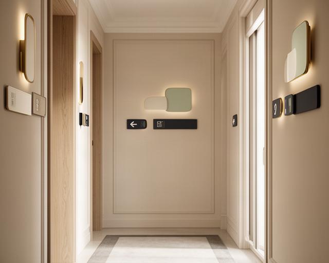 Segnaletica interna elegante per le camere di un hotel ligure